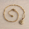 Stainless steel wave necklace with decorated heart – gold – SS211