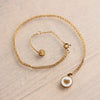 Stainless steel fine necklace with round mother-of-pearl charm – SS200