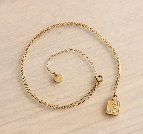 Stainless steel fine necklace 'AU REVOIR' – gold – SS225