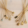 Stainless steel fine necklace with round mother-of-pearl charm – SS200