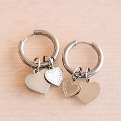 Stainless steel ear studs with double heart charms – silver – SO709